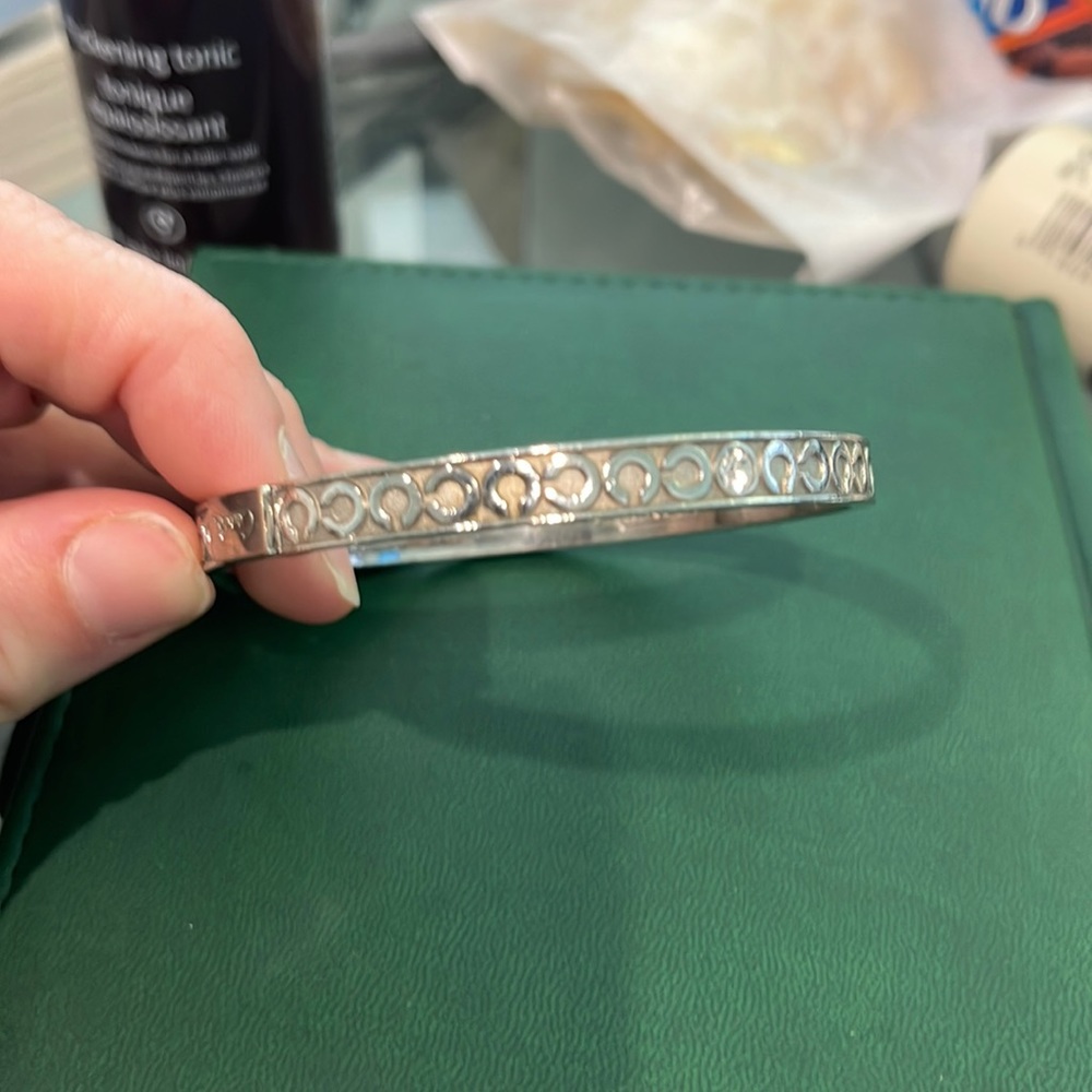 Silver coach bangle bracelet
